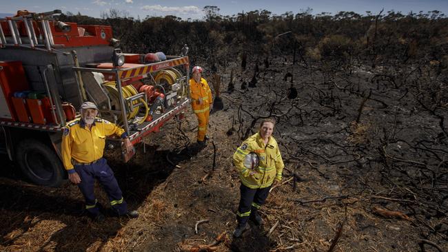 RFS Currarong volunteers stand by the hazzard reduction fire which sparked some painful memories for the community. Picture: Sean Davey