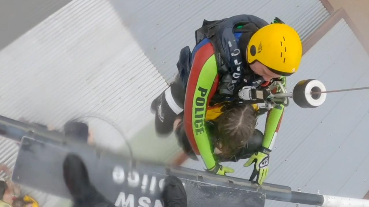Watch: Incredible wild-weather rescue to save stranded kids