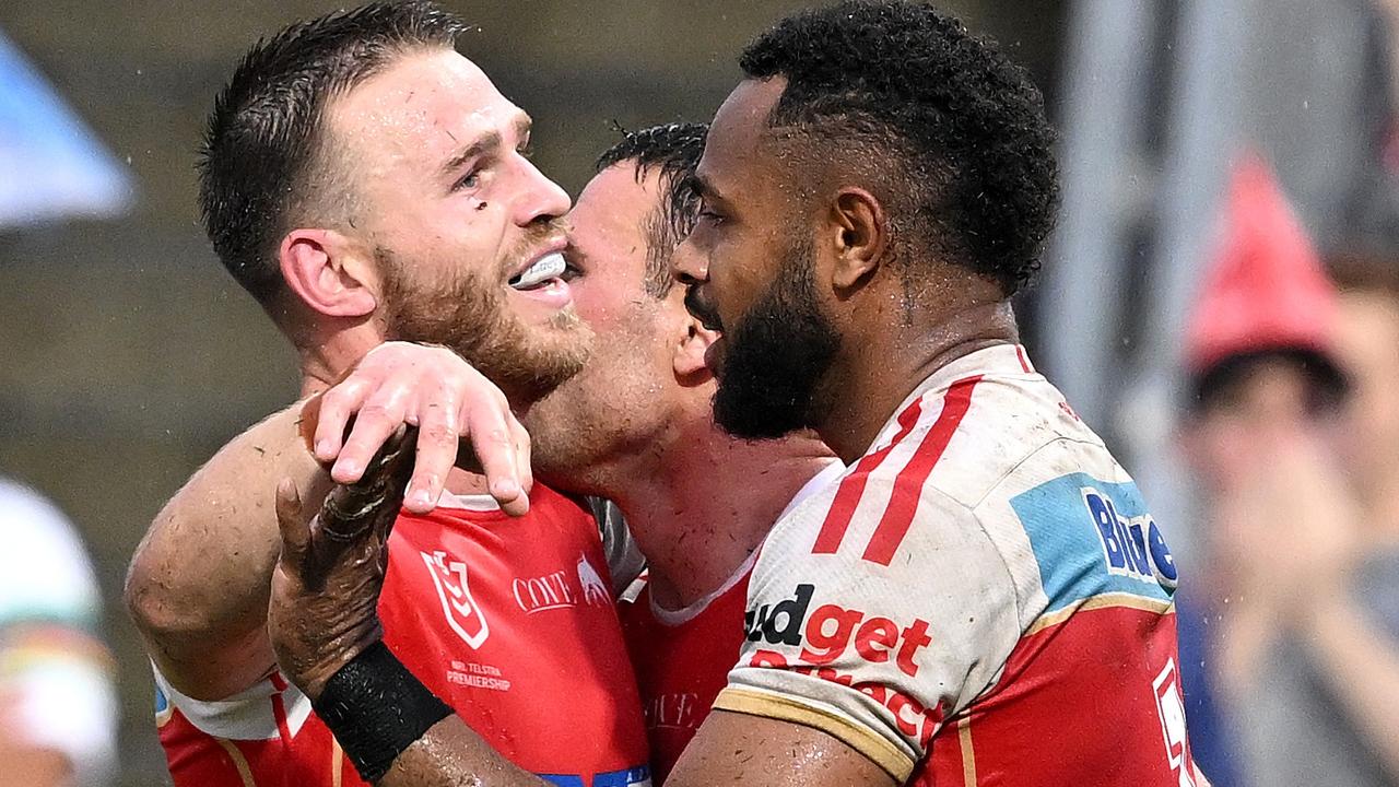 Hamiso Tabuai-Fidow (right) celebrates with teammates after scoring a try against the Canberra Raiders. Picture: Getty Images