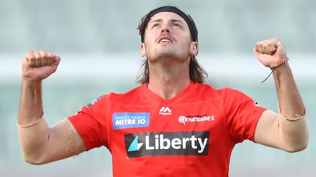 MELBOURNE, AUSTRALIA - JANUARY 26: Zak Evans of the Renegades celebrates after dismissing Nathan Ellis of the Hurricanes during the Big Bash League match between the Melbourne Renegades and Hobart Hurricanes at Melbourne Cricket Ground, on January 26, 2021, in Melbourne, Australia. (Photo by Mike Owen/Getty Images)