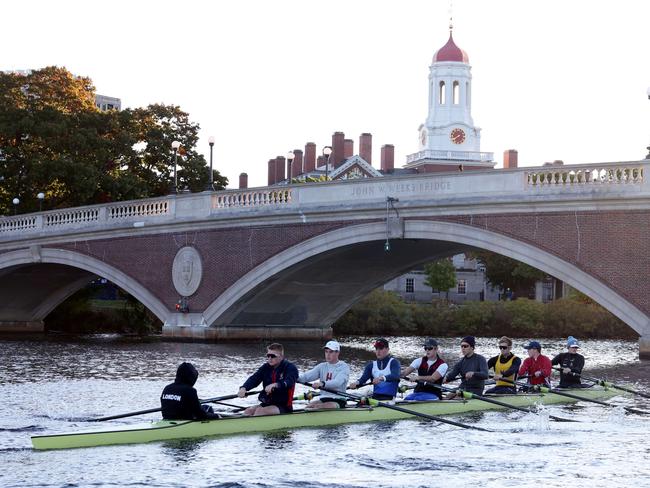 CAMBRIDGE, MASSACHUSETTS - OCTOBER 20: Members of the Harvard University Men's Heavyweight Rowing team train on the Charles River on October 20, 2022 in Cambridge, Massachusetts.   Maddie Meyer/Getty Images/AFP