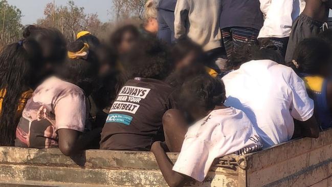 Ironically, one of the 33 people in the back of the tray can be seen wearing a T-shirt emblazoned with a road safety message: ‘Always wear your seatbelt’ Picture: NT Police