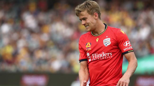 Adelaide United’s Kristian Opseth reacts to his saved penalty, having earlier scored his first A-League goal. Picture: AAP Image/Jeremy Ng