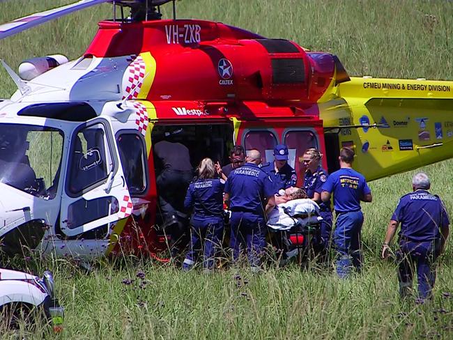 The Westpac Lifesaver Rescue Helicopter and emergency crews moved the man slowly by road to the helicopter. Picture: Frank Redward