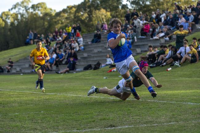 Seb Kracht on the move for St Edmund's.