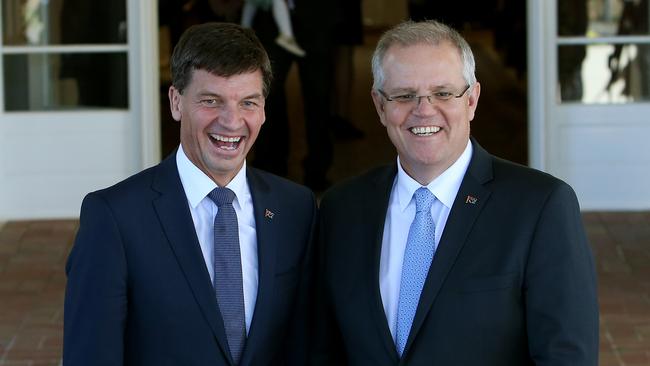 Minister for Energy Angus Taylor joins PM Scott Morrison in the cabinet swearing-in ceremony at Government House, Canberra. Picture: Kym Smith