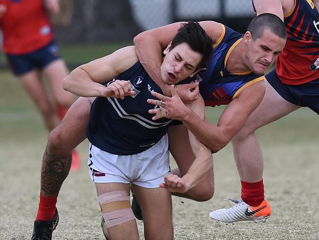 Harley Balic, playing for Parkdale Vultures in 2019, gets an opponent high.