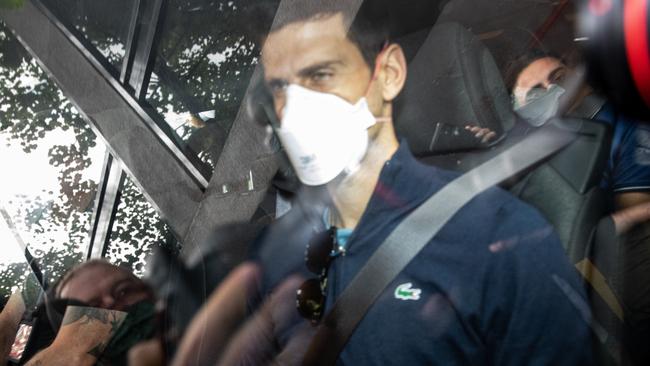 Novak Djokovic leaves the Park Hotel last January after being deported. Picture: Diego Fedele/Getty Images