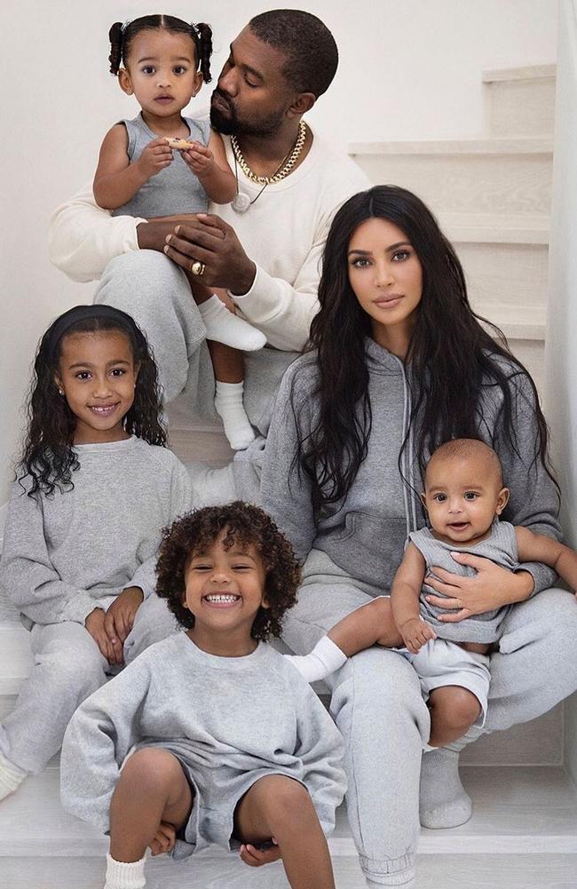 Kardashian and West with their kids.