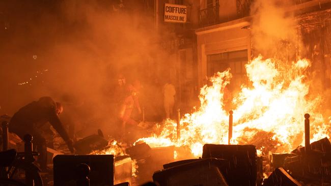 Fires have become commonplace in French streets as protesters continue to rally against pension reforms. Picture: Anna Kurth/AFP