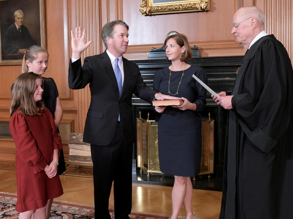 Brett Kavanaugh is sworn in as his family looks on. Picture: Fred Schilling/Supreme Court via Reuters