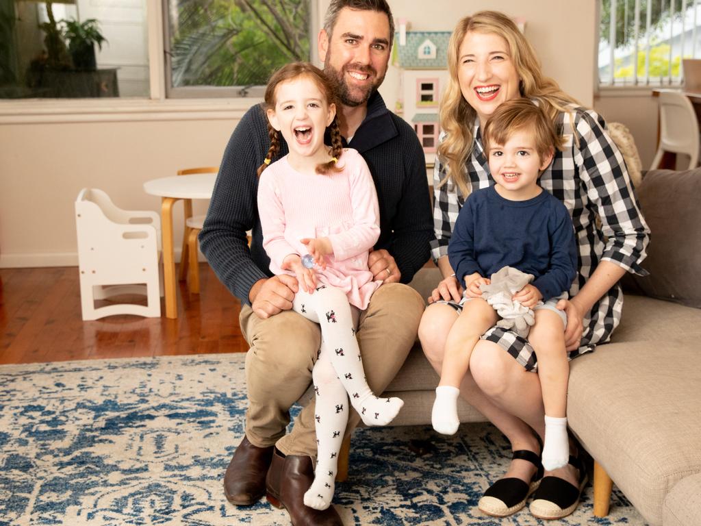 Stephen Mallyon and Louise Beard with their children Lucy, 4, and Charlie, 2, at home in Gladesville, NSW. Picture Ryan Osland