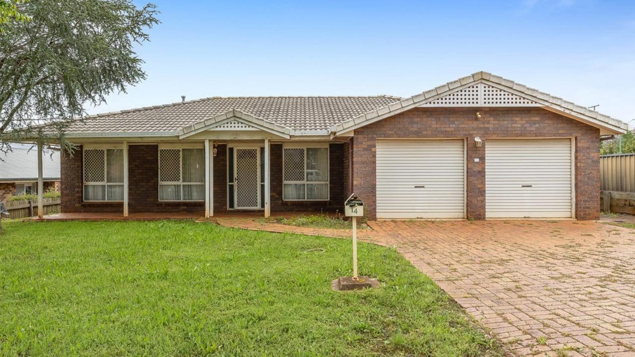 This four-bedroom house at 14 Roslyn St, Centenary Heights, is for sale by negotiation.