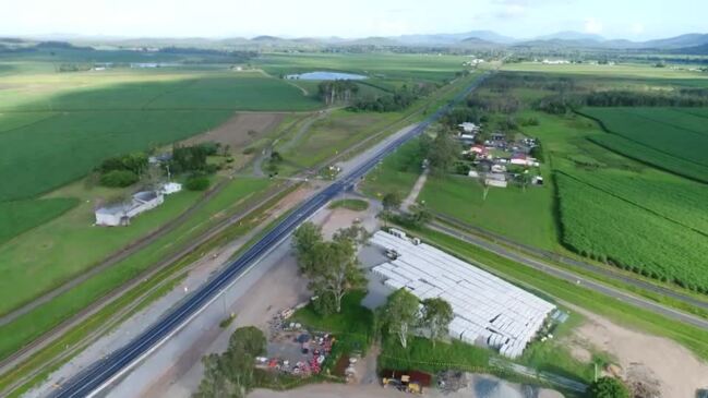 Video shows flooding of Bruce Highway upgrades at Calen