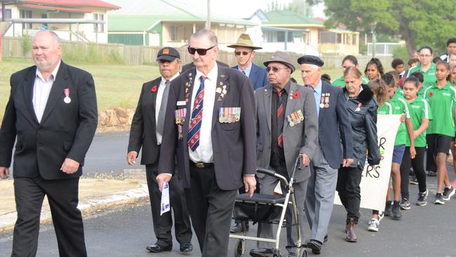 School children and veterans marched to the memorial in Cherbourg for Anzac Day, 2017.