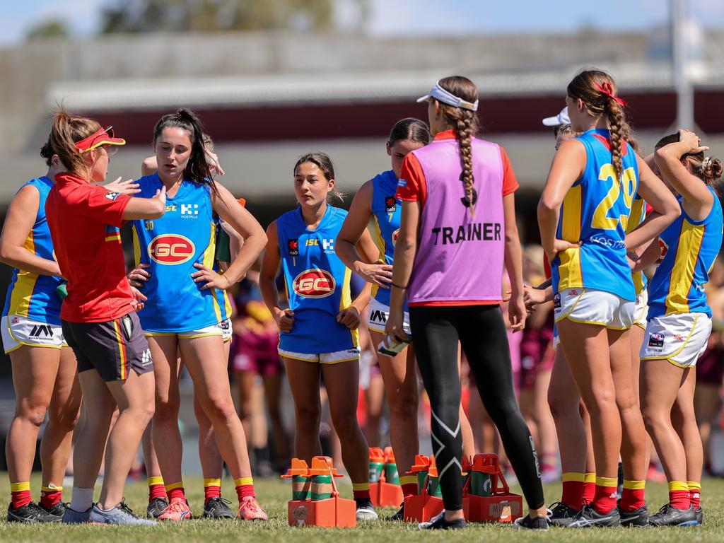 The Gold Coast Suns quarter time huddle during the AFLW U17 Championship match between the Brisbane Lions and the Gold Coast Suns at Moreton Bay Sports Complex on September 22, 2021 in Burpengary, Australia. Picture: Russell Freeman