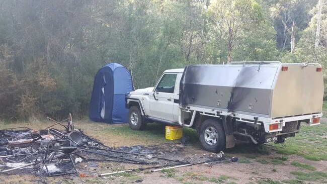 Russell Hill and Carol Clay’s burnt-out campsite photographed by a camper near in the Wonnangatta Valley. Picture: ABC