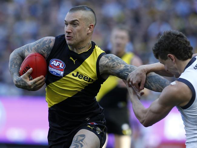 2019 AFL Grand Final match between the Richmond Tigers and the GWS Giants at the MCG on September 28, 2019 in Melbourne, Australia. GWS's Jacob Hopper can't stop Richmond's Dustin Martin. Picture: David Caird