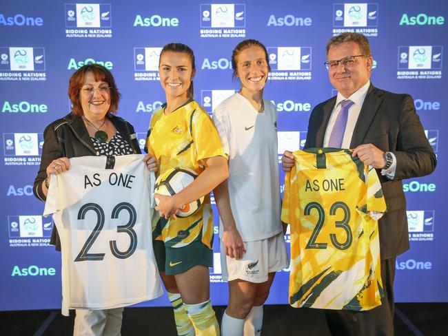 MELBOURNE, AUSTRALIA - DECEMBER 13: Johanna Wood, New Zealand Football President and Chris Nikou, FFA chairman with Australia and New Zealand players Stephanie Catley and Rebekah Stott during the announcement of Australia & New Zealand's Joint Bid to host the FIFA Women's 2023 World Cup, at AAMI Park on December 13, 2019 in Melbourne, Australia. (Photo by Wayne Taylor/Getty Images)