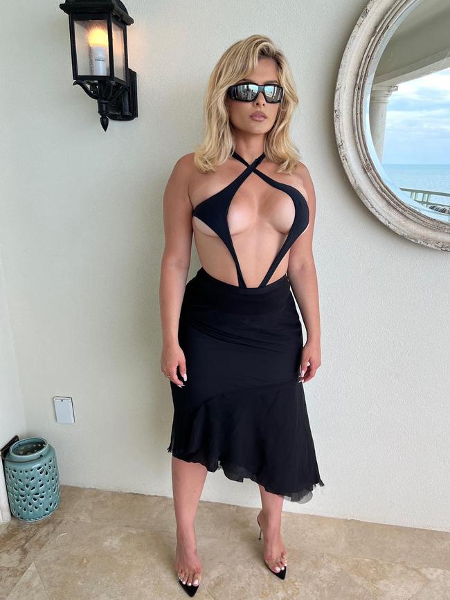 She paired the togs with a black skirt, heels and sunglasses. Picture: Instagram/beberexha