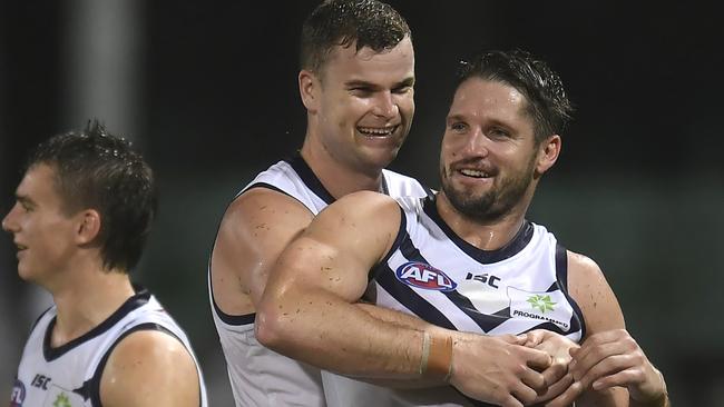 CAIRNS, AUSTRALIA - SEPTEMBER 07: Jesse Hogan and Sean Darcy of the Dockers celebrate their victory during the round 16 AFL match between the Melbourne Demons and the Fremantle Dockers at Cazaly's Stadium on September 07, 2020 in Cairns, Australia. (Photo by Albert Perez/Getty Images)