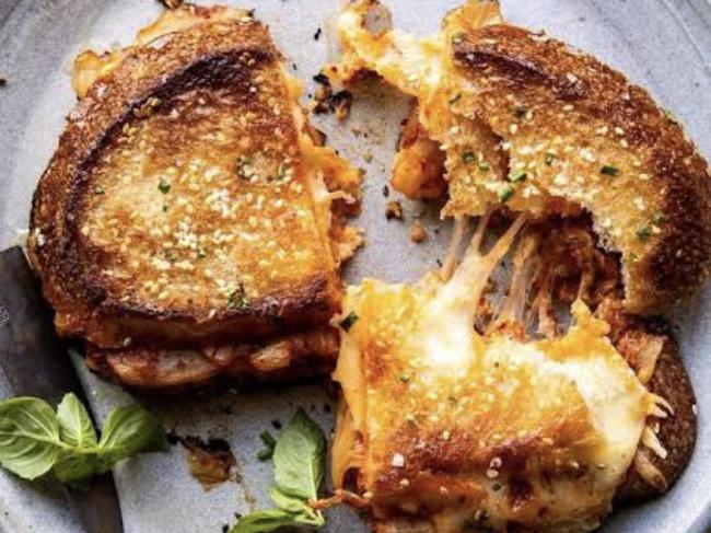 The trio loves firing up the jaffle maker on set and creating variations of cheese toasties like this one from Andy Allen. Picture: Supplied