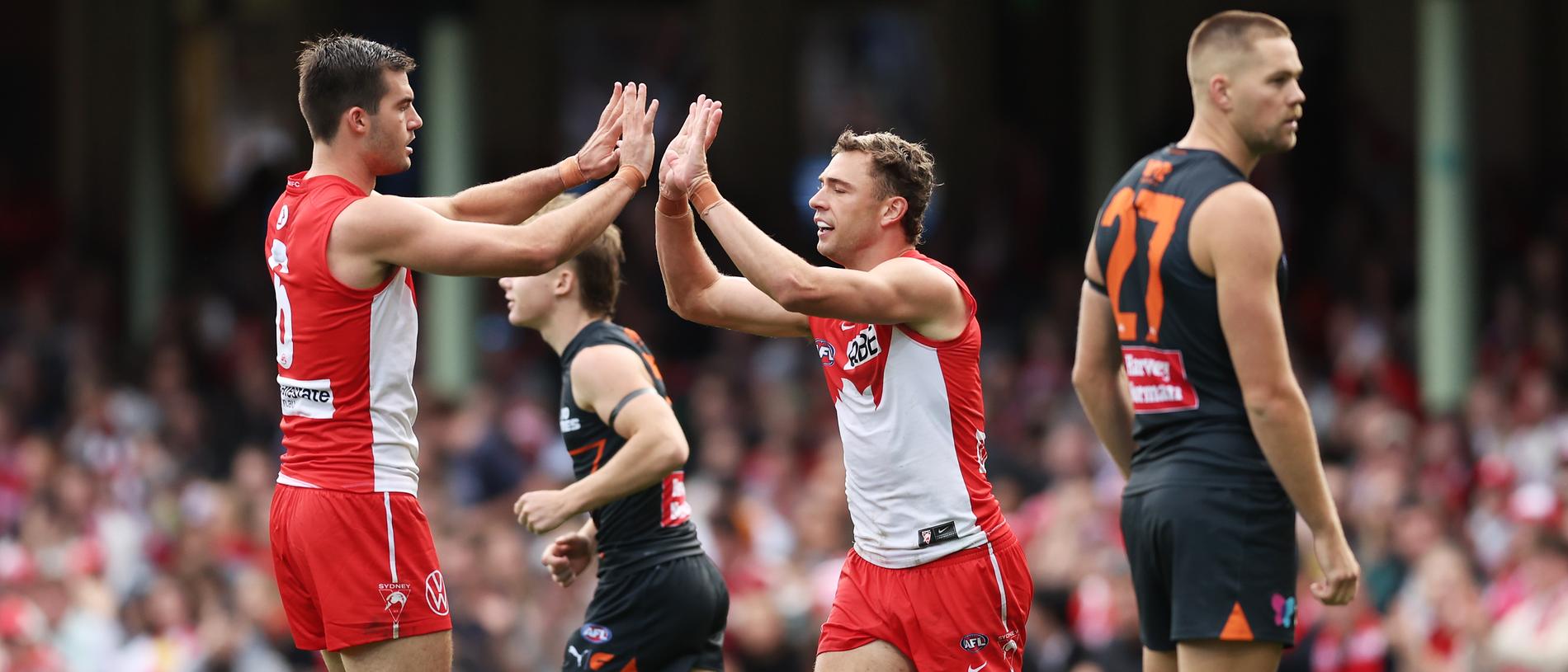 SYDNEY, AUSTRALIA - MAY 04:  Will Hayward of the Swans celebrates with team mates after kicking a goal during the round eight AFL match between Sydney Swans and Greater Western Sydney Giants at SCG, on May 04, 2024, in Sydney, Australia. (Photo by Matt King/AFL Photos/via Getty Images )