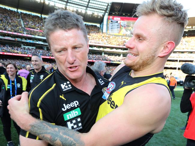 2019 AFL Grand Final. 28/09/2019.  Richmonds Brandon Ellis  hugs coach Damien Hardwick    after the 2019 AFL Grand Final match between the Richmond Tigers and the GWS Giants at the MCG on September 28, 2019 in Melbourne, Australia. Picture: Michael Klein.