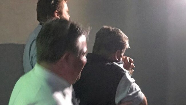 A man is taken into Maroochydore Watchhouse by police after he was arrested in relation to the woodchipper death of Nambour man Bruce Saunders. Contributed