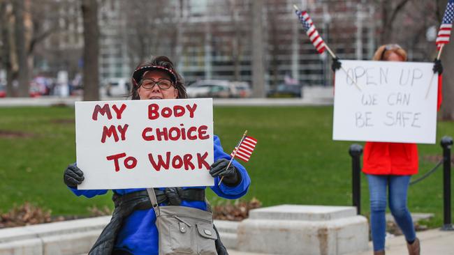 Two of the 1500 protesters. Picture: Kamil Krzaczynski/AFP