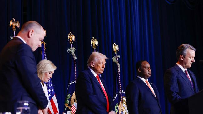 US President Donald Trump bows his head during the National Prayer Breakfast at the Washington Hilton on Thursday. Picture: AFP