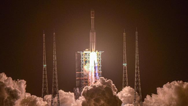 A Long March 7 rocket, carrying the Tianzhou-2 cargo craft, lifts off from the Wenchang Space Launch Centre, late on Saturday. Picture: AFP