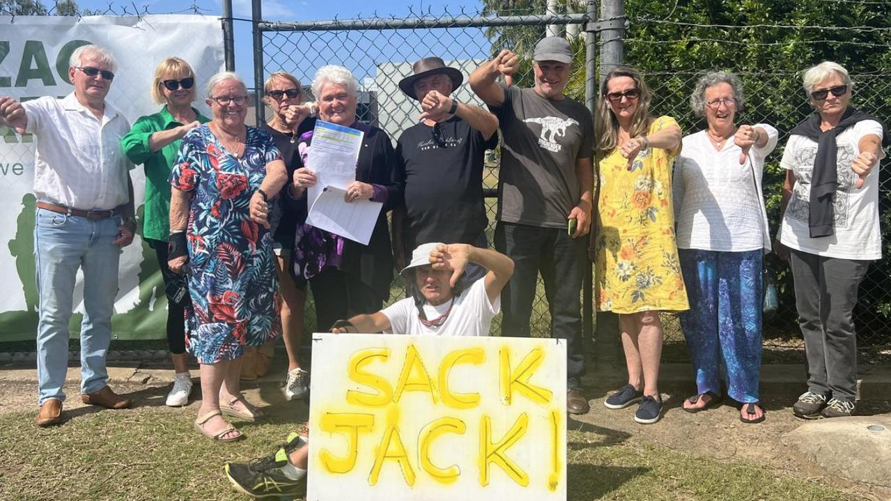 Local residents brandished signs calling for Mr Dempsey's sacking at protests outside the historic Anzac Pool pool as demolition started for the Bundaberg Aquatic Centre project in September 2022.