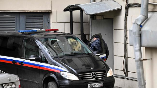 Evan Gershkovich is escorted out of the Lefortovsky court in Moscow. Picture: AFP