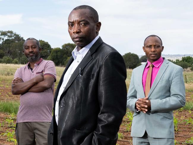 Revival Pentecostal Church President Patrick Ntakiyiruta (front) with members Altemon Ndabirinde, Matthias Ngendere, Noel Nihuze, Nestor Barutwanayo and Jeanie Barambuliye standing together on the property they are growing Maize on to raise money to build a church in Penfield/ Kaurna Yarta on Saturday, October 7, 2023. (The Advertiser/ Morgan Sette)