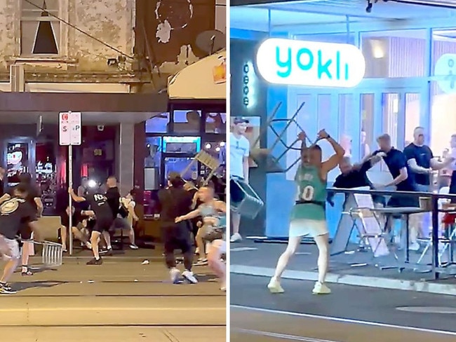 A video uploaded to Tik Tok has shown two groups of men, believed to be rival soccer fans, hurtling metal chairs and umbrellas at each other on a popular Melbourne strip.