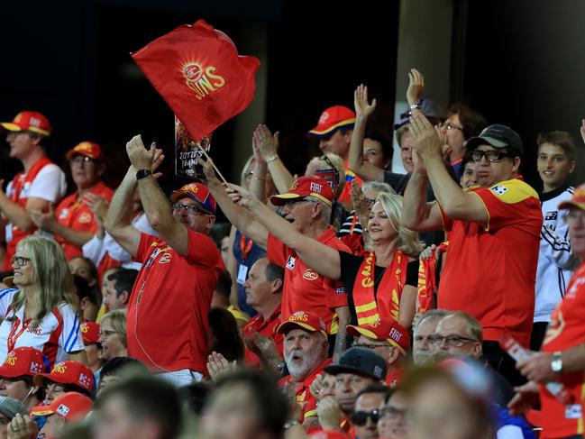 The crowd gets behind the Suns during the Round 1 AFL game between the Gold Coast Suns and the Brisbane Lions at Metricon Stadium, Carrara. Pics Adam Head