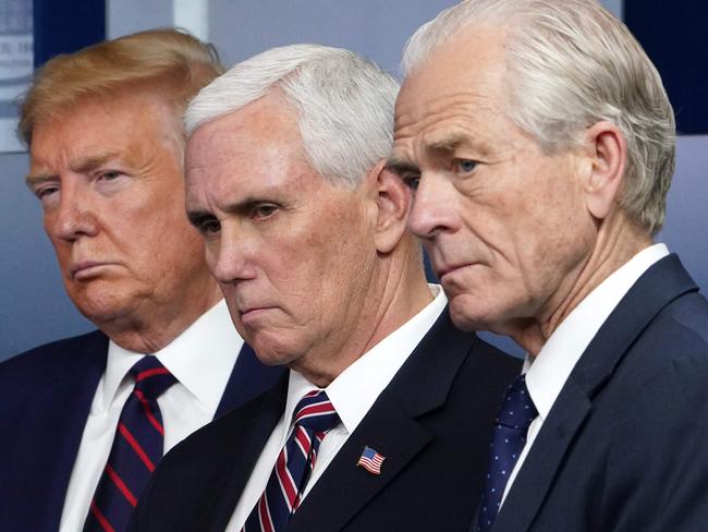 US Director of Trade and Manufacturing Policy Peter Navarro (right) with President Trump and Vice President Pence. Picture: AFP