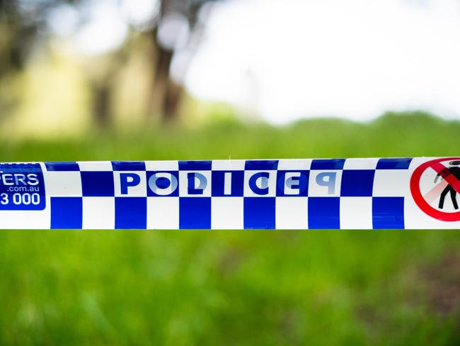 Police tape at the entrance to Shearer Park in Lansvale where 3 people tragically drowned on Saturday.Photo: Tom Parrish