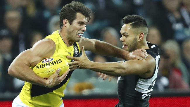 Port’s Jarman Impey takes on Richmond premiership star Alex Rance. Picture: Sarah Reed