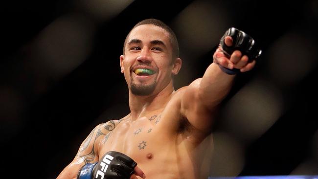 KANSAS CITY, MO — APRIL 15: Robert Whittaker celebrates after defeating Jacare Souza to win their Middleweight bout on UFC Fight Night at the Sprint Center on April 15, 2017 in Kansas City, Missouri. Jamie Squire/Getty Images/AFP == FOR NEWSPAPERS, INTERNET, TELCOS &amp; TELEVISION USE ONLY ==