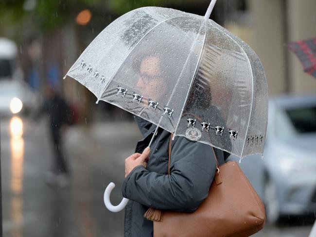 Wet weather in Victoria Square, Adelaide. Picture: Greg Higgs