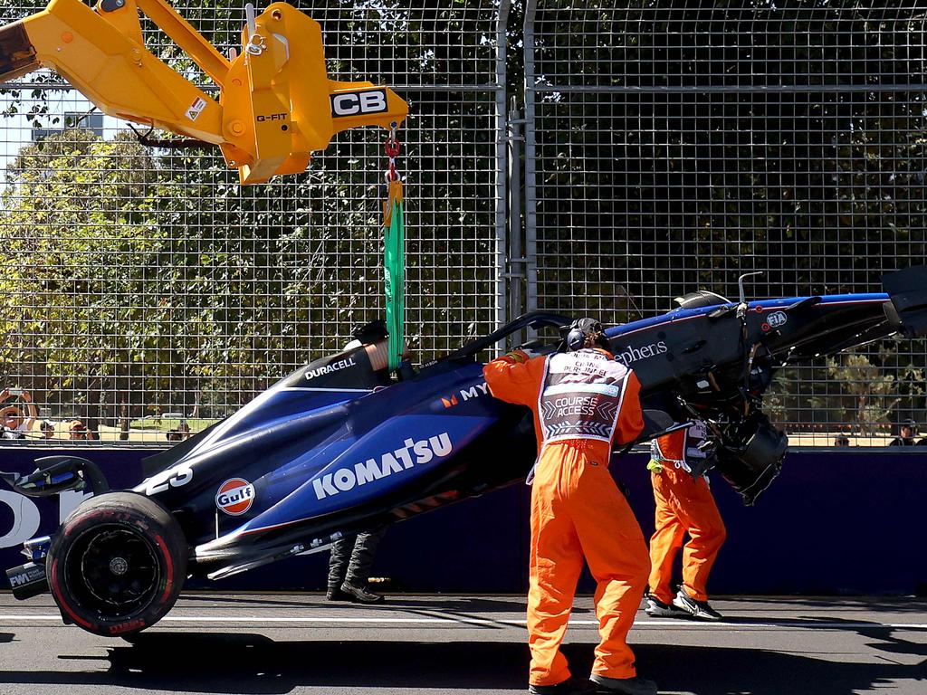 Marshals remove Williams' Thai driver Alexander Albon’s crashed car from the circuit. Picture: AFP