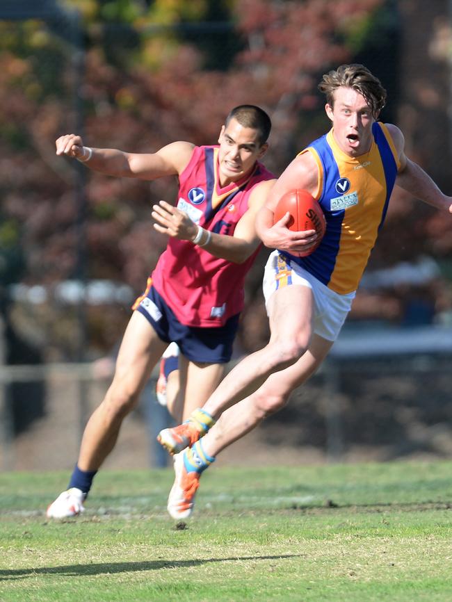 Old Scotch’s Ashley Lim chases DeLa Salle’s Sam Williams. Picture: Susan Windmiller