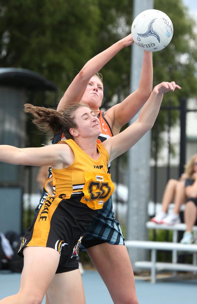 Geelong West Goal Shooter Aleisha McDonald over Grovedale's Bonnie Coburn. Picture: Mike Dugdale