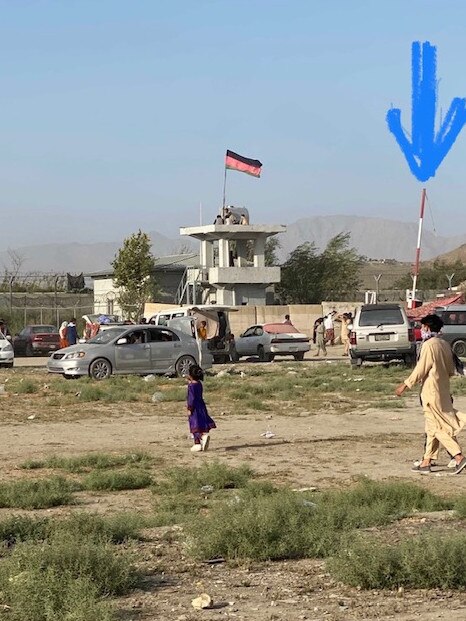 Marking meeting points to help facilitate the movement of evacuees around the airport at Kabil to evade the Taliban and coordinate with DFAT and military staff