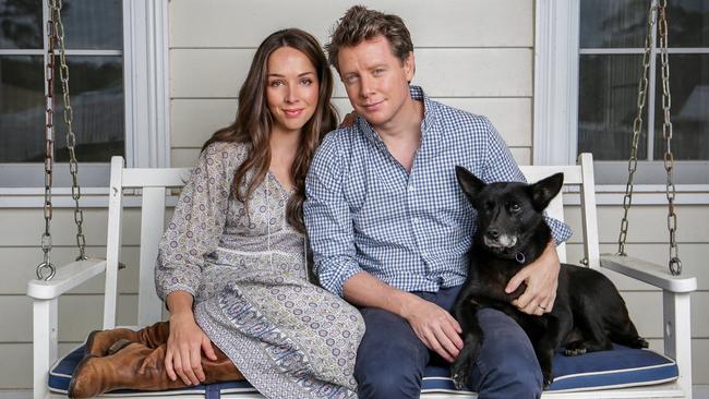 Barefoot Investor Scott Pape, with his wife Liz and their dog Better at their farm in rural Victoria. Picture: Nicole Cleary