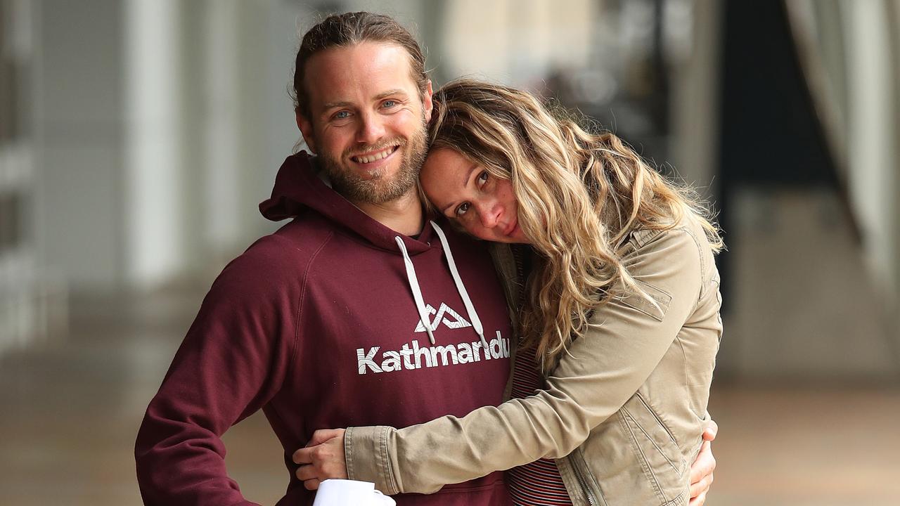 Adam Draper greets his girlfriend Stacey Brown on arrival. Picture: Brett Costello