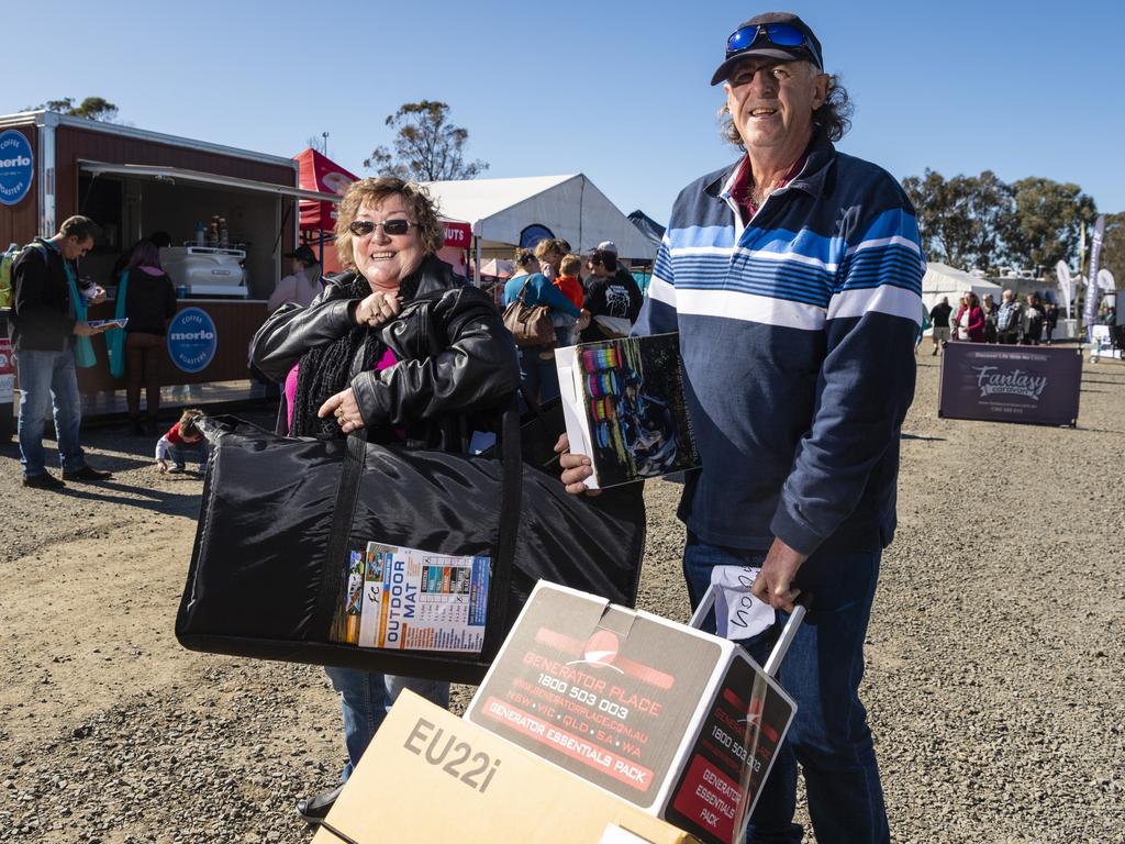 Jenny and Ian Webber with purchases from the Queensland Outdoor Adventure Expo at the Toowoomba Showgrounds, Saturday, July 30, 2022. Picture: Kevin Farmer