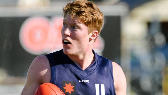 Matthew Rowell with the ball during the 2019 AF; national championships, SA against Vic Metro at Alberton Oval on Saturday, June 22, 2019. (AAP Image/ Morgan Sette)
